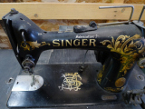 Singer avec frein au genoux